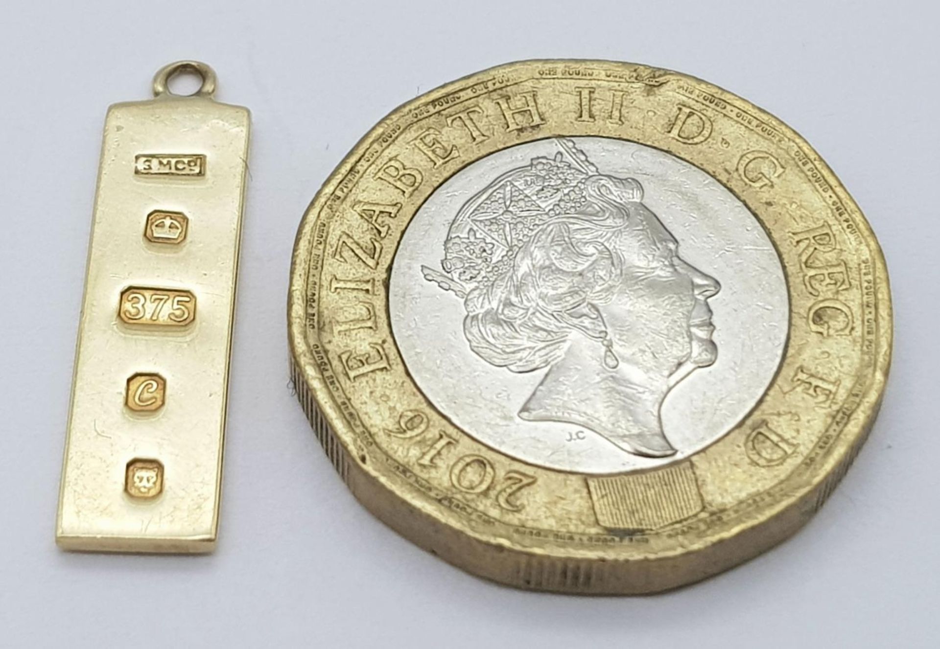 A 9K YELLOW GOLD INGOT PENDANT 1.5G , 21mm x 6mm. SC 9016 - Image 4 of 4