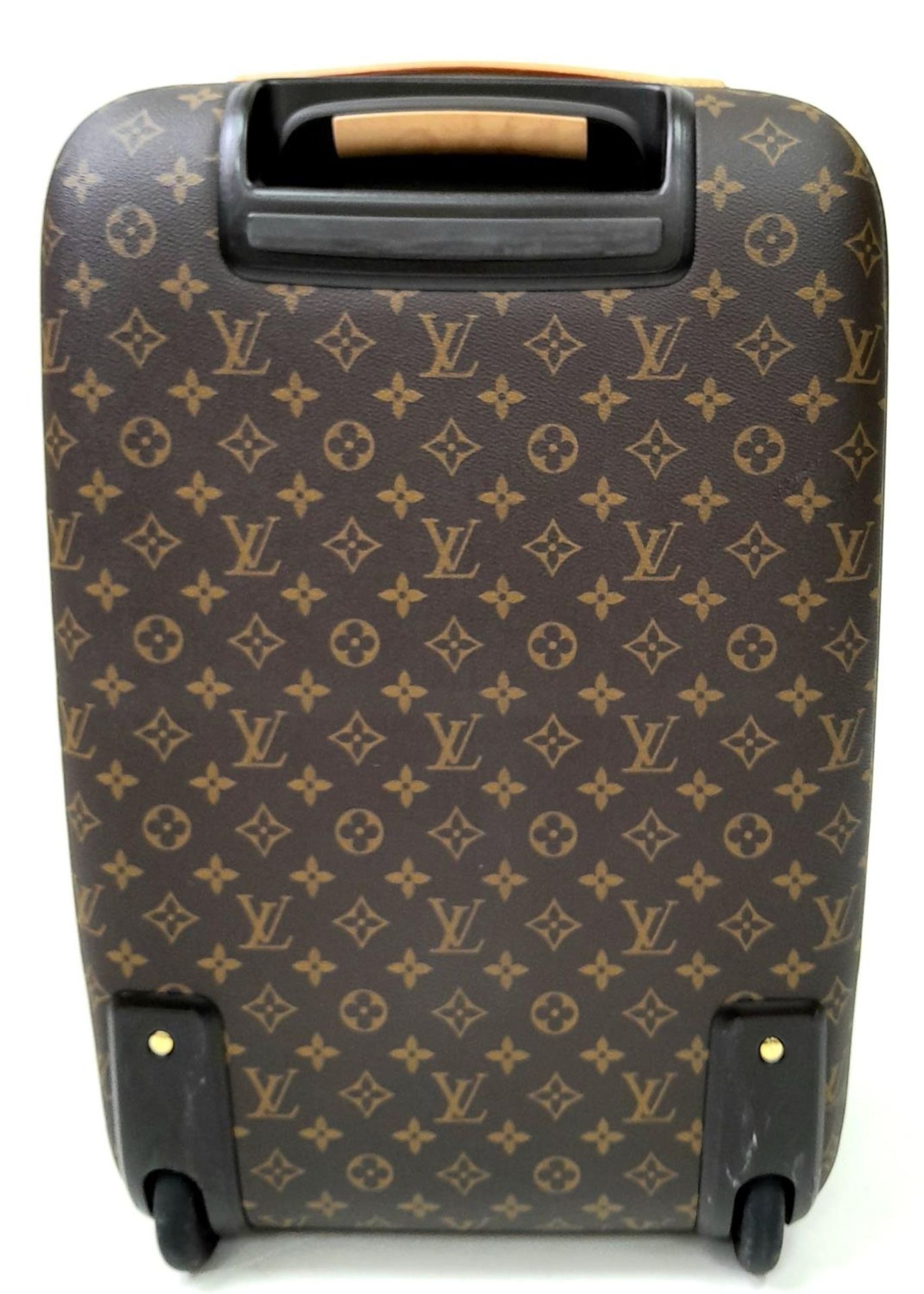 A Louis Vuitton Monogram Pegase Suitcase. Durable leather exterior with gold-toned hardware. Front - Image 3 of 16