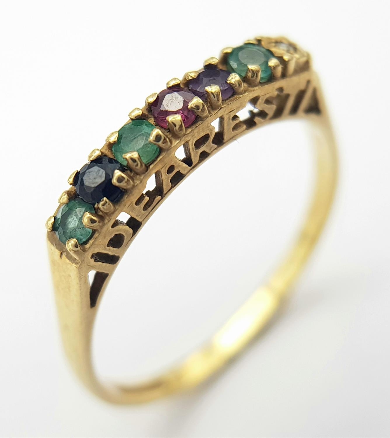 A 9K YELLOW GOLD GEMSTONE SET DEAREST RING 1.4G SIZE O. SC 9007