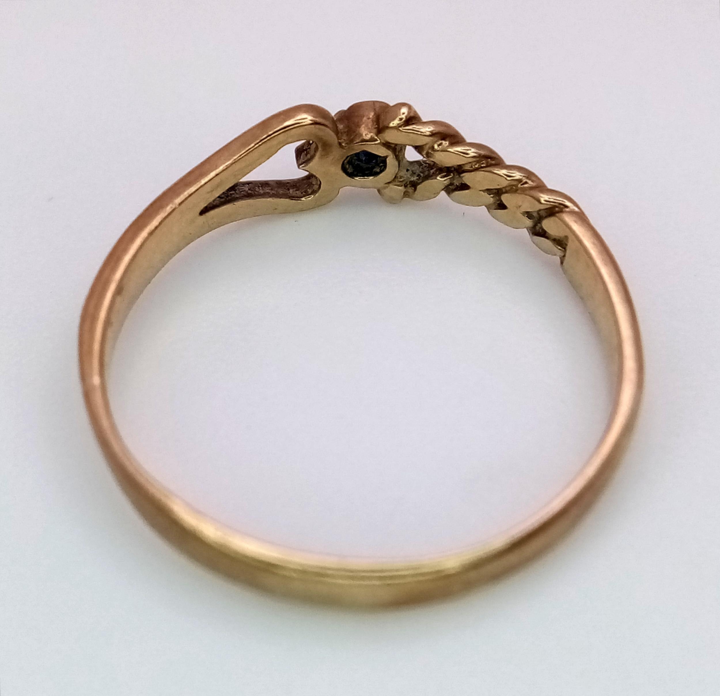 A 9K Yellow Gold and Sapphire Love Ring. Size J. 1.1g weight. - Image 4 of 5