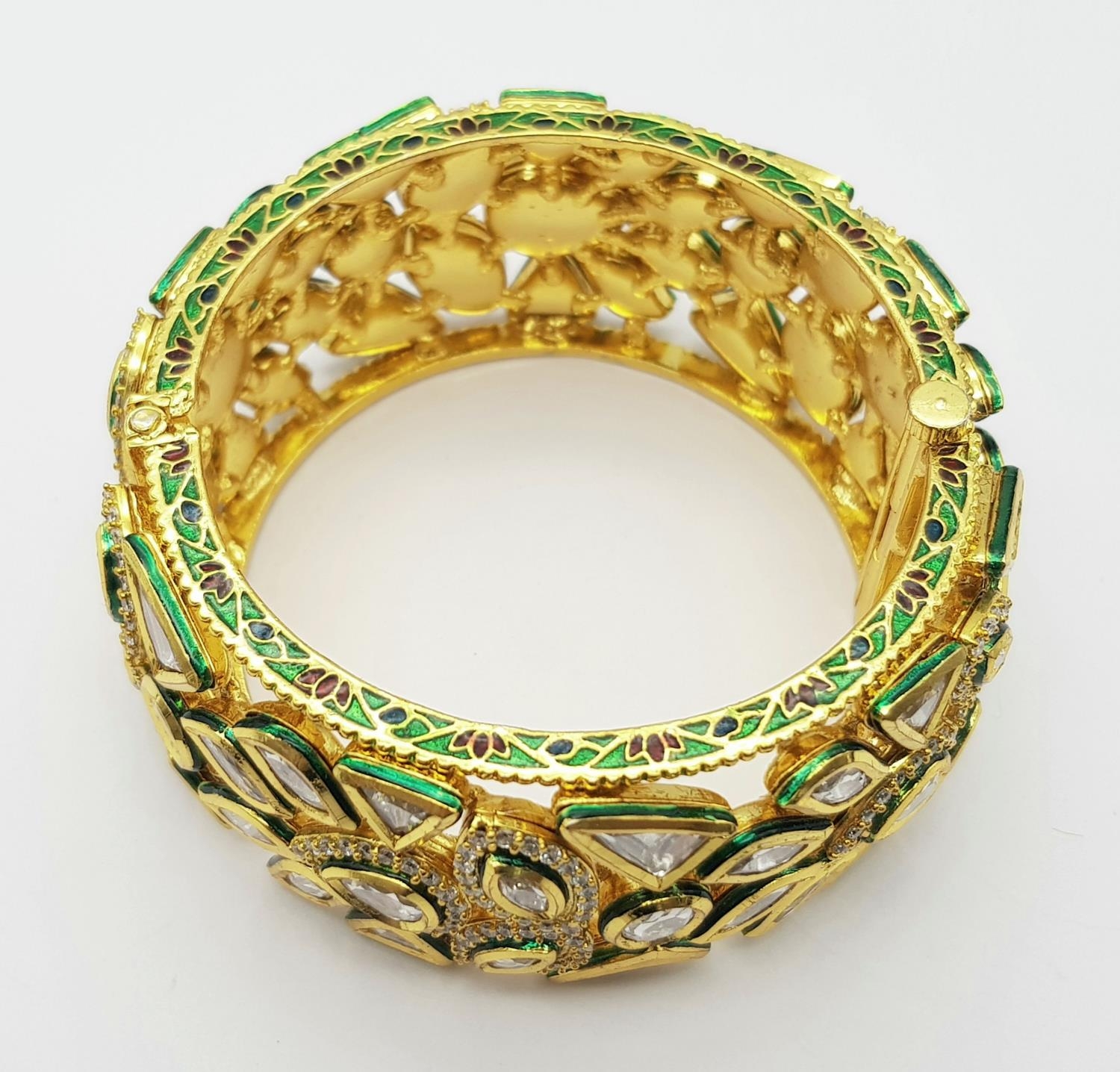 A Mughal Style White Stone and Enamel Bangle. 5.5cm diameter, 3cm band width, 97.12g total weight. - Image 4 of 5