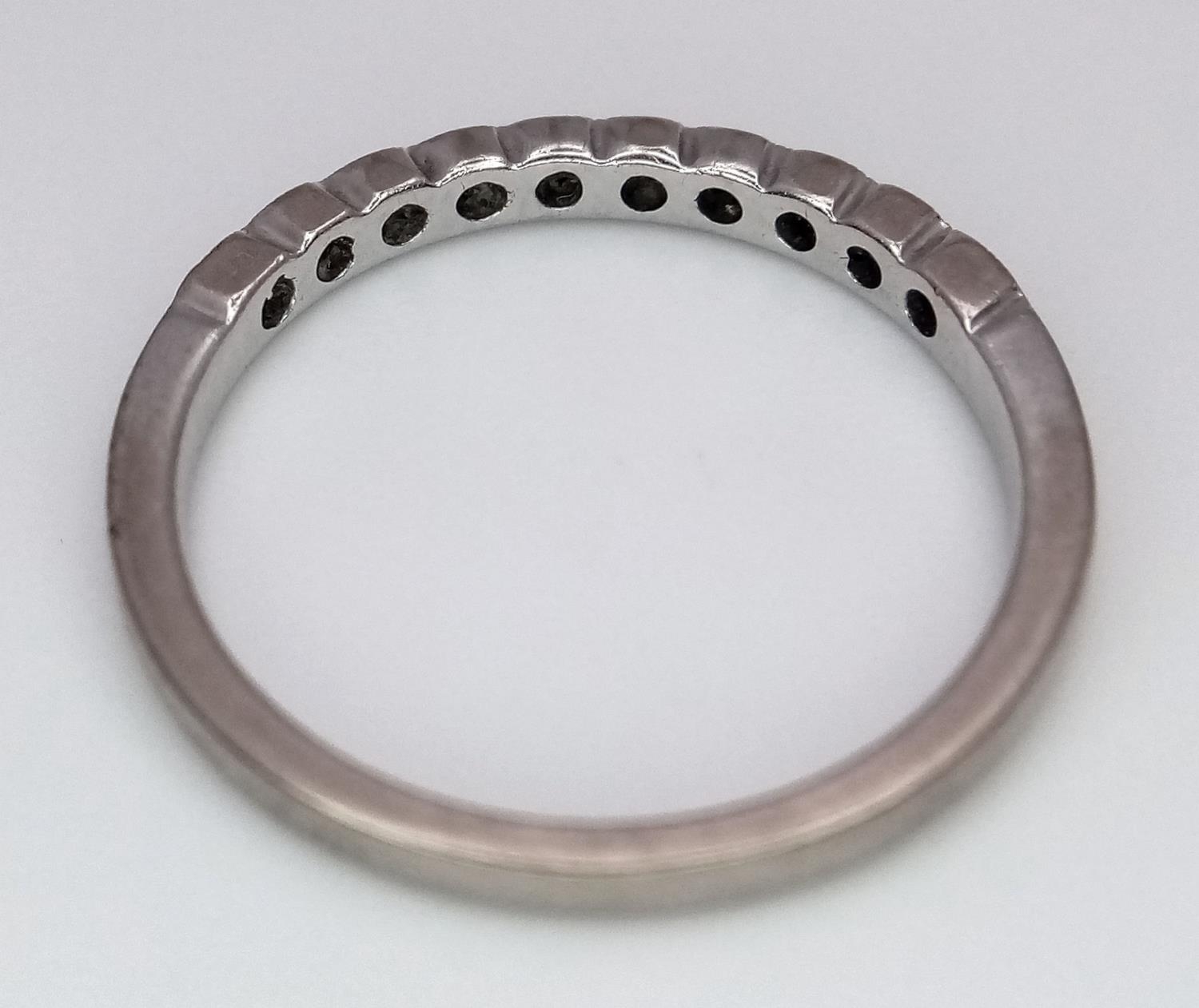 A Brown's Designer 18K White Gold and Diamond Half Eternity Ring. Size M. Comes with a Browns box. - Image 4 of 6