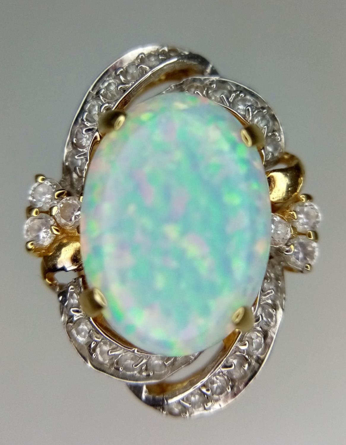 A 14K Yellow Gold and Opal Ring. White stone decoration. Size O. 6g total weight. - Image 4 of 7