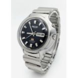 A Vintage Ricoh 21 Jewels Automatic Gents Watch. Stainless steel bracelet and case - 41mm. Black