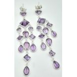 A Pair of Amethyst Multi-Cut Drop Earrings. Set in 925 Silver. 6cm drop. Ref: CD-1316