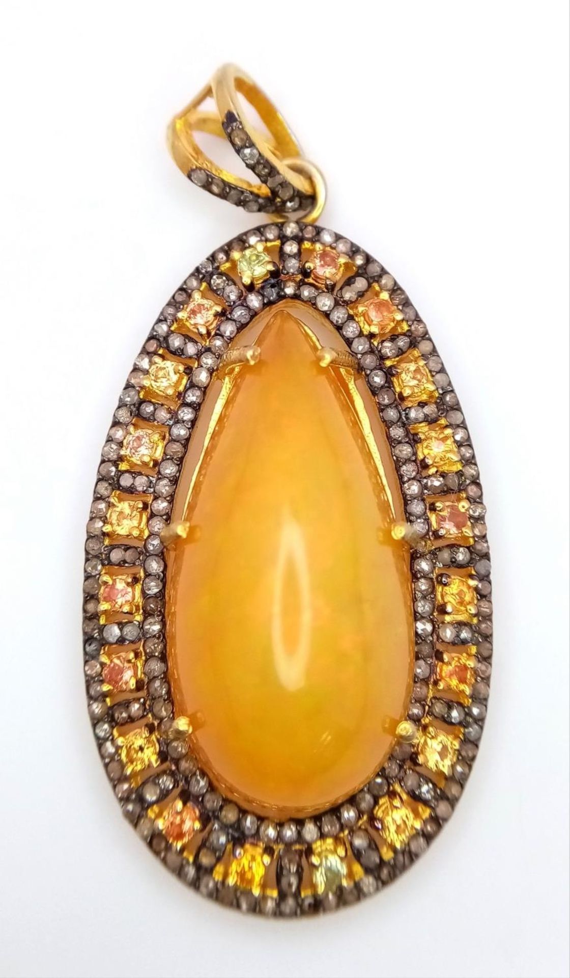 An Australian Fire Opal Pendant with Yellow Sapphires and Old Cut Diamond Surround set in Gilded 925