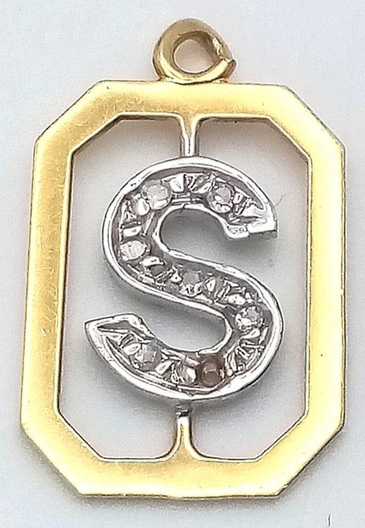 AN 18K YELLOW GOLD DIAMOND SET INITIAL S CHARM. 16mm length, 0.9g total weight. Ref: SC 9041