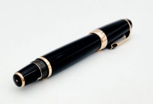 A Montblanc Retractable Fountain Pen - 14k Nib. 11cm