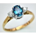 A 9K YELLOW GOLD DIAMOND & BLUE TOPAZ 3 STONE RING 1.4G SIZE M. ref: SPAS 9012