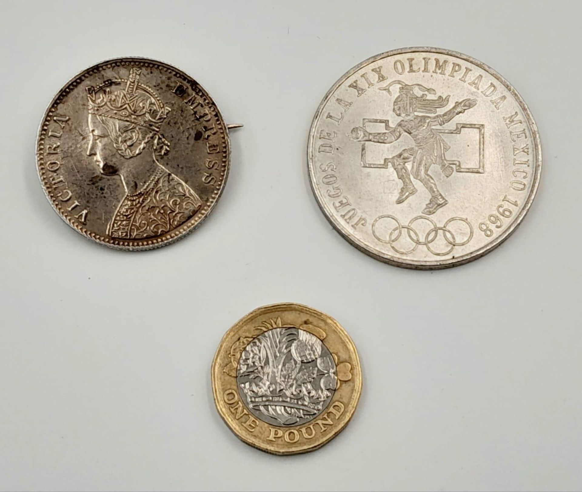 A 1968 Mexican Summer Olympics Silver 25 Pesos Coin and a 1901 Silver One Rupee Indian Brooch. - Image 4 of 4
