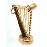 A 9K YELLOW GOLD IRISH HARP CHARM, POSSIBLY GUINESS THEMED. 2.9cm length, 4.2g weight. Ref: SC 8137