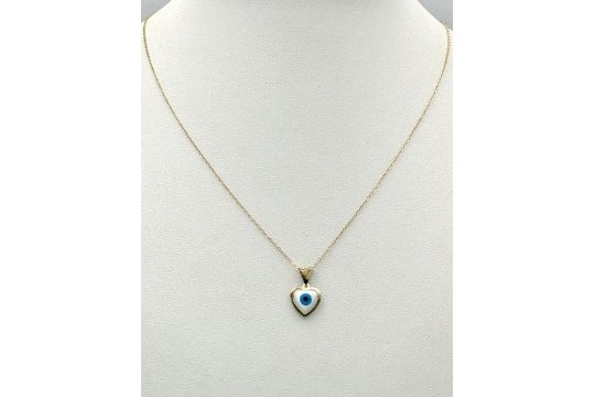 An 18K Gold and Enamel Evil Eye Pendant on an 18K Gold Disappearing Necklace. 14mm. 44cm length. - Bild 1 aus 6