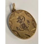 Antique Yellow Metal NAVAL SWEETHEART LOCKET. Oval shape. Beautifully decorated. Opens and closes