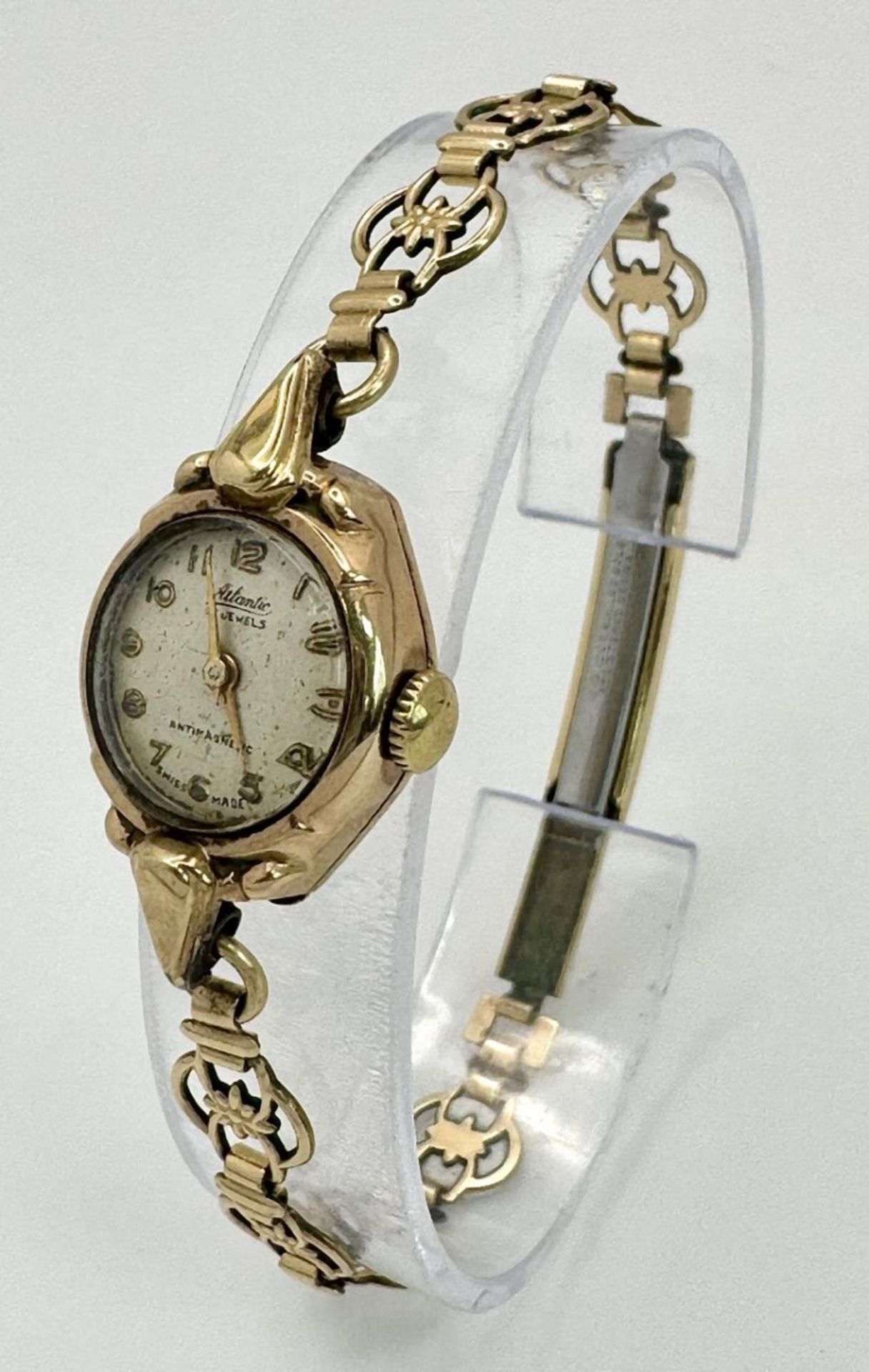 At Atlantic 9K Gold Cased Ladies Watch. Mechanical movement. Works but because of age no