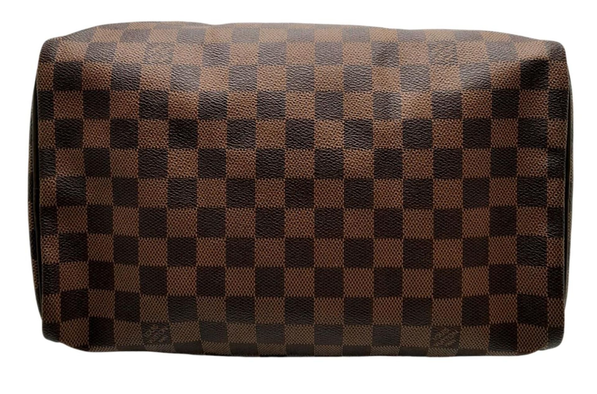 A Louis Vuitton Damier Ebene Speedy Thirty Bag. Brown Damier Ebene canvas exterior with gold-toned - Bild 5 aus 11