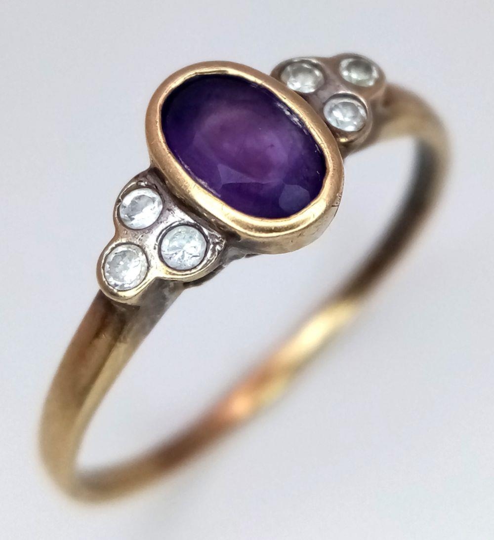 A 9K YELLOW GOLD DIAMOND & AMETHYST RING. 1.6G IN WEIGHT. SIZE P. Ref: SC 6036