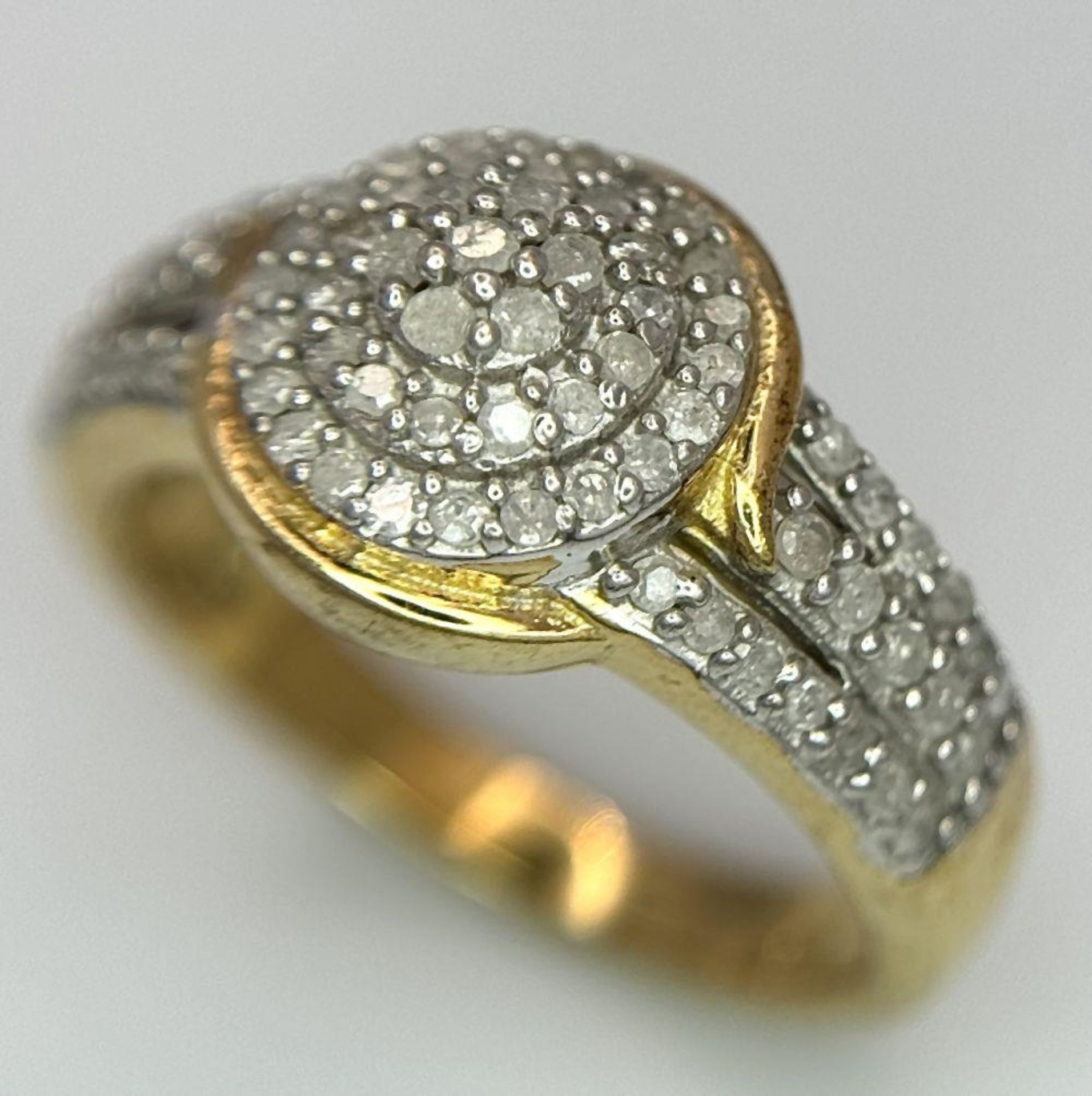 A Yellow Gold Gilt Sterling Silver Diamond Set Ring Size P. Tiered Mount Set with a Profusion of