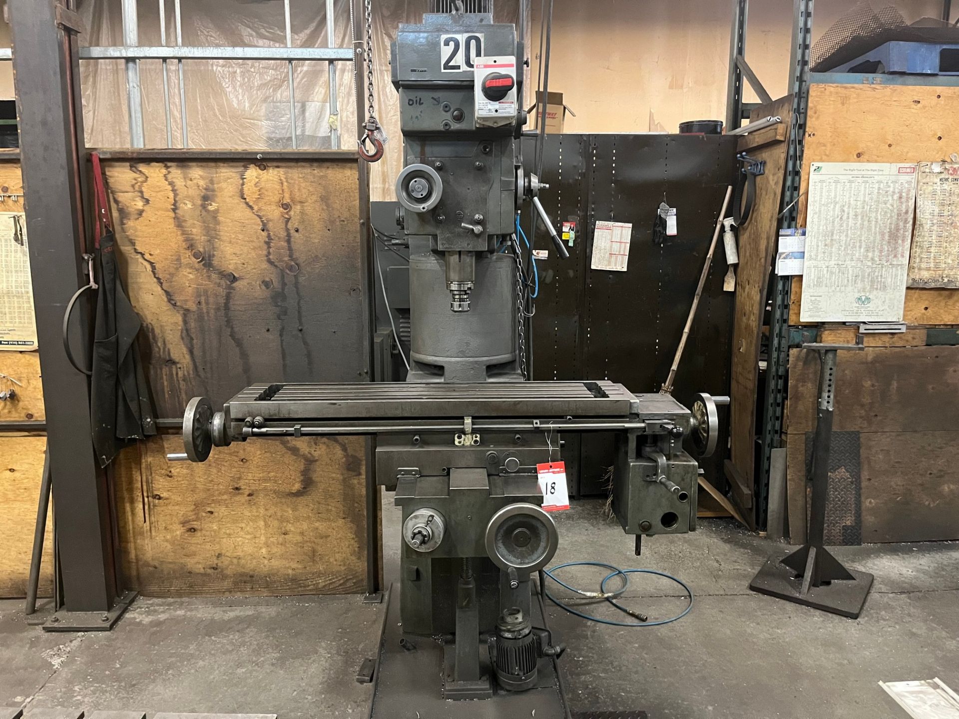 VERTICAL MILLING MACHINE, X-AXIS POWER FEED, 10” X 42” TABLE, 40 NMT SPINDLE, 84 – 2,750 RPM, STEP