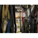 LOT OF ASST. LIFTING & RIGGING STRAPS W/ RACK