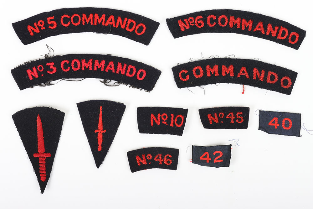 Selection of cloth shoulder and arm badges to the Royal Marines.