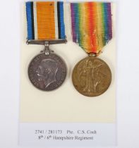 A Great War pair of medals to a recipient in the Hampshire Regiment who post war served in the Corps
