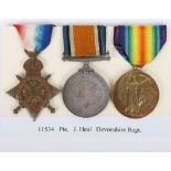 A Great War 1914-15 Star medal trio to a Private in the Devonshire Regiment who was discharged unfit