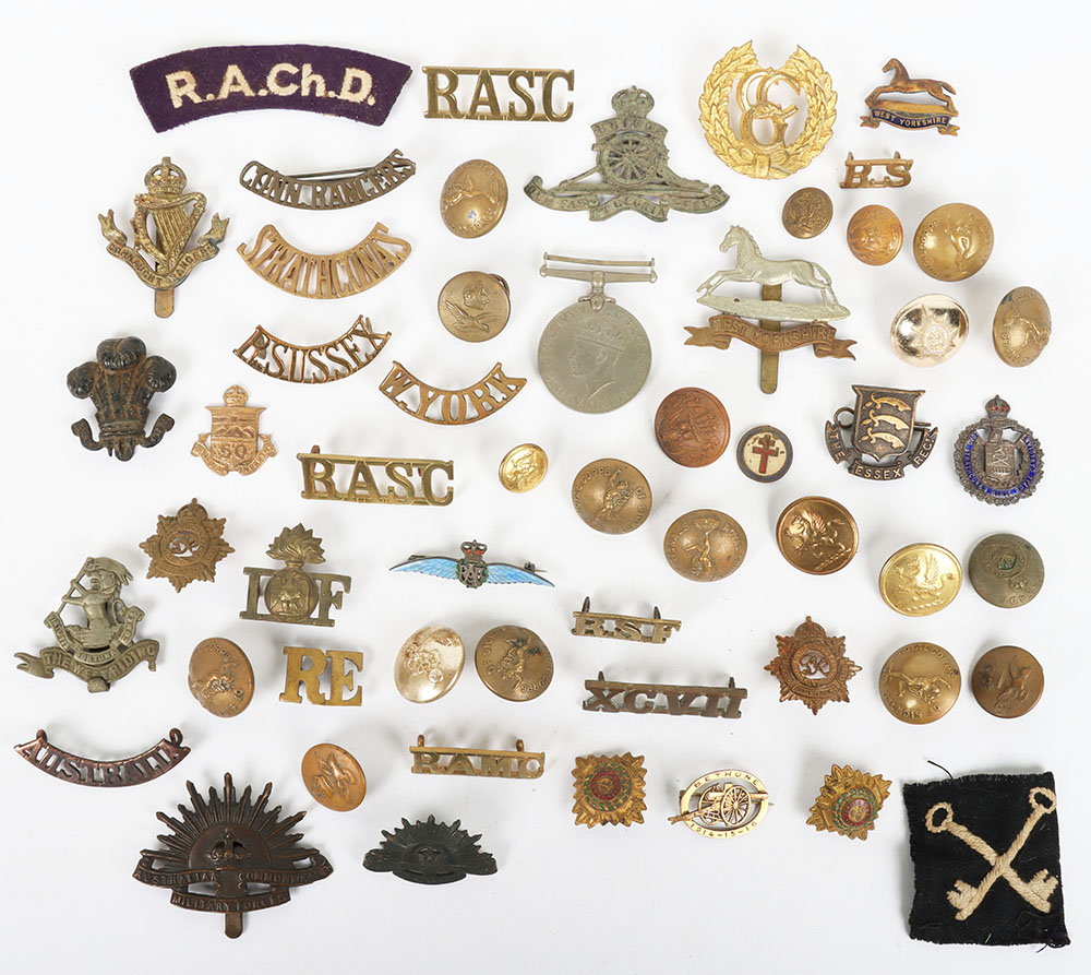 Large Quantity of cap badges, collar badges, cloth & metal shoulder titles