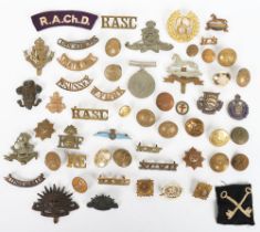 Large Quantity of cap badges, collar badges, cloth & metal shoulder titles