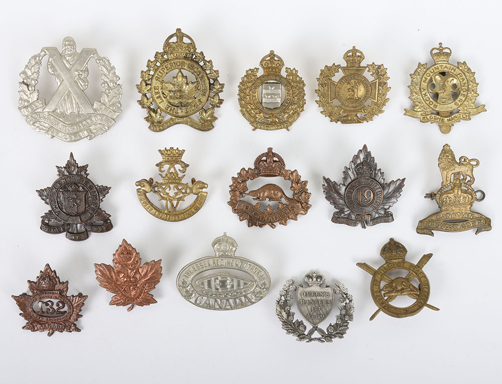 Assortment of Canadian cap badges