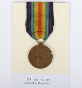 A single Victory medal to a soldier in the 8th Battalion Hampshire Regiment who landed a Suvla Bay i