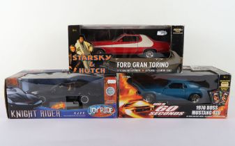 Three TV Film related 1:18 Scale Die Cast Metal Cars boxed,