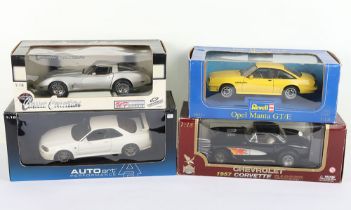 Four 1:18 Scale Die Cast Metal Cars boxed,