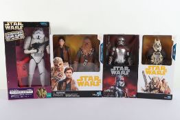 Four Modern Star Wars 12 inch Action Figures Dolls Boxed Hasbro.