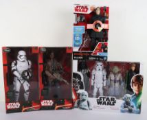 Four Modern Star Wars Action Figures Dolls boxed Hasbro.