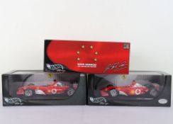 Three Hot Wheels Racing Ferrari Formula One 1:18 Scale Model Cars.