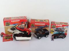 Three Vintage M.A.S.K. Mask Kenner Boxed vehicles with Action Figures.