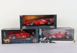 Three Hot Wheels Racing Ferrari Formula One 1:18 Scale Model Cars.