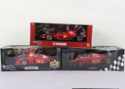 Three Hot Wheels Minichamps Racing Ferrari Formula One 1:18 Scale Model Cars.
