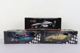 Three Minichamps 18 Formula One 1:18 Scale Model Cars.