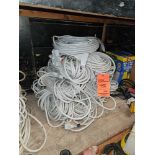 Lot of (9) 12/3 white 100 foot extension cords with triple tap