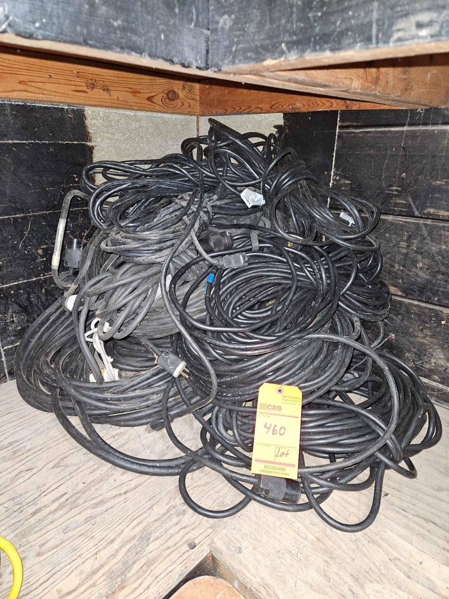 Lot of assorted 12/3 black extension cords with single tap, (2) 100ft, (1) 80ft, (4) 50ft, (30 40ft