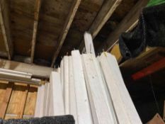 Lot of (121) 10ft wood sidepoles, including (86) white and (35) stained wood