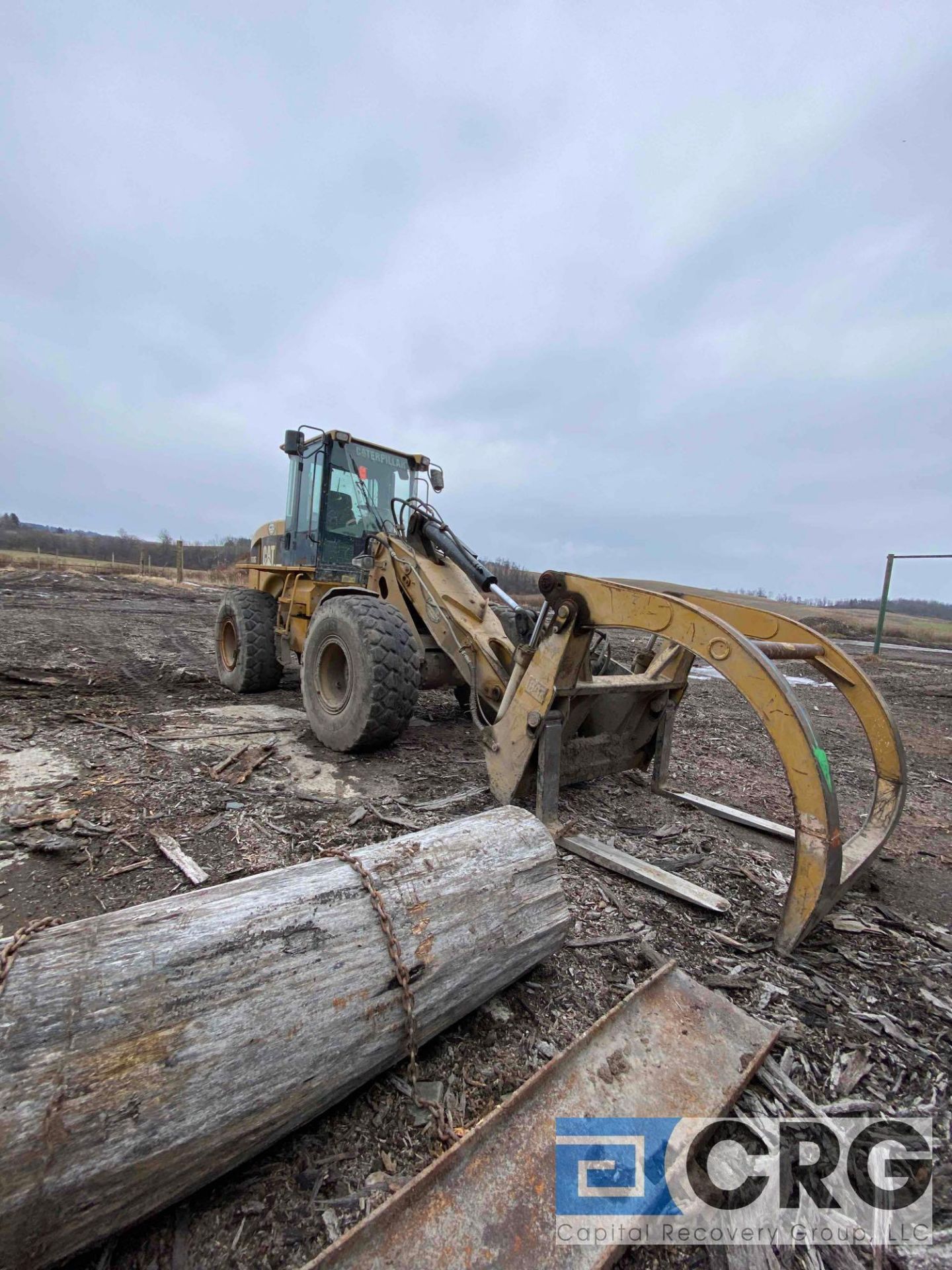 CAT 930G Wheel loader, PID CAT0930GCTWR00852 19,495 hours; with 67in. wide log-grapple attachment- - Image 3 of 12