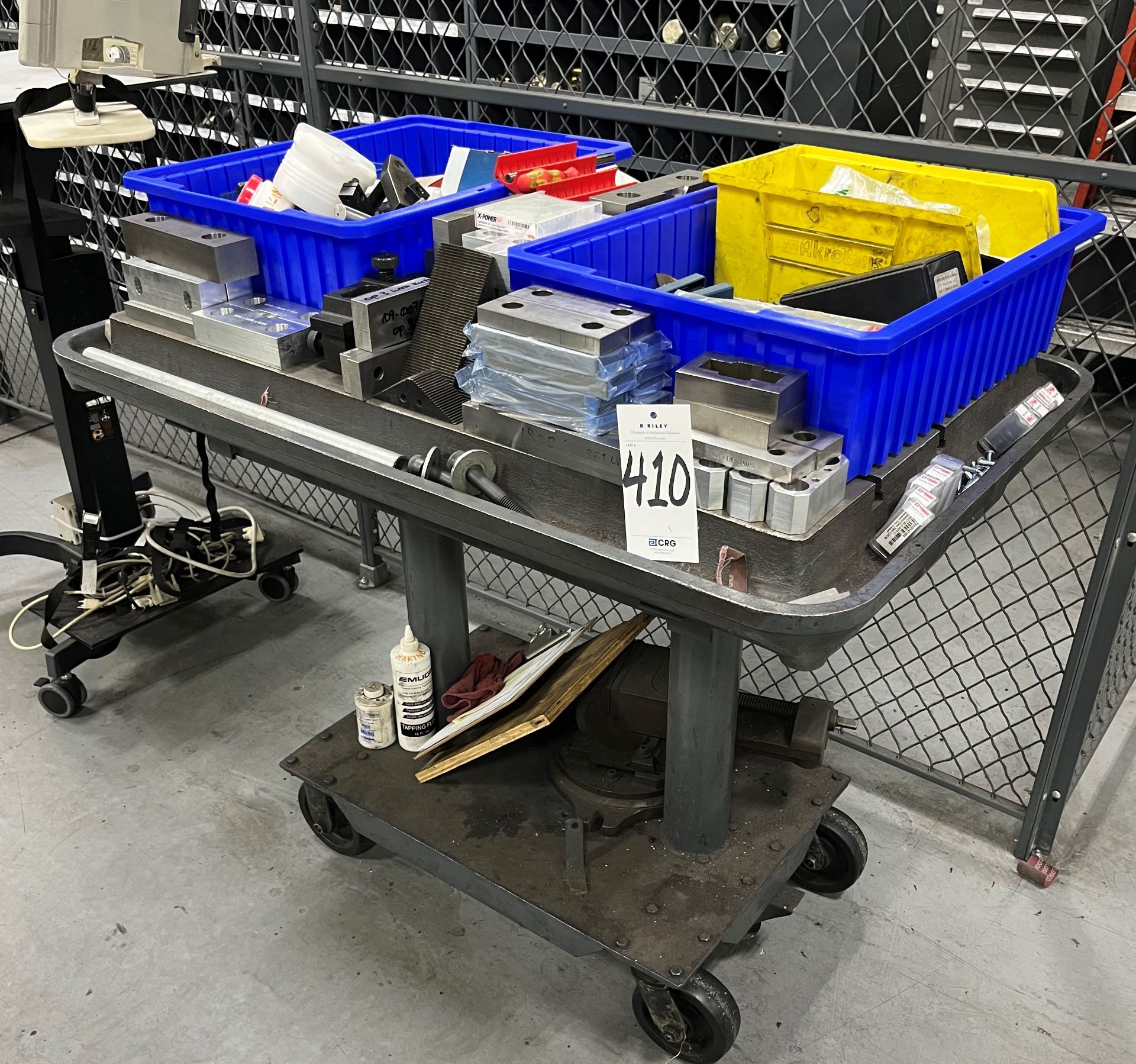 Elevating 4 wheel cart with miscellaneous hardware and tooling