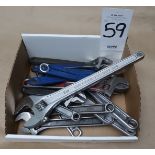 Large assortment of adjustable wrenches