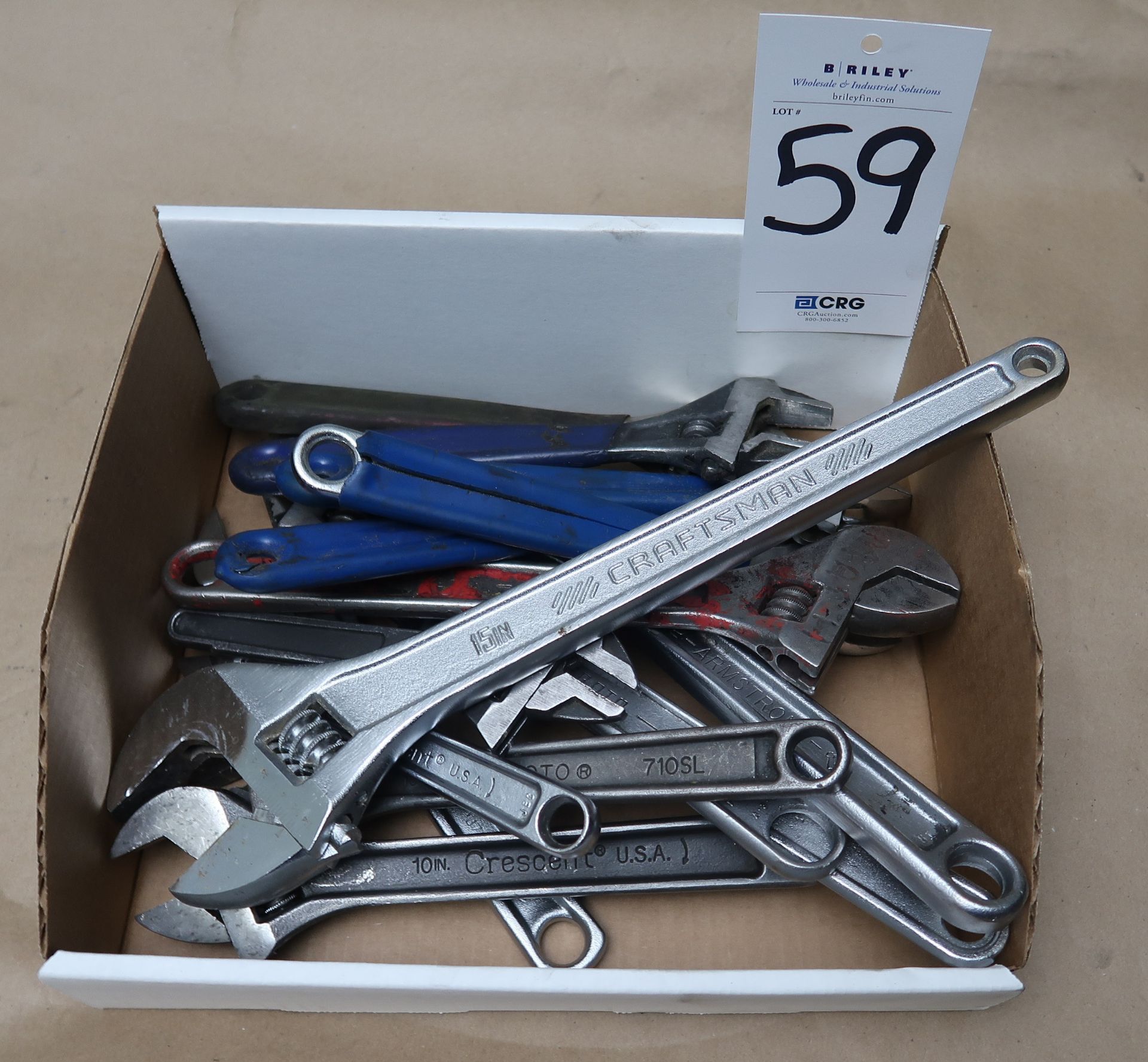 Large assortment of adjustable wrenches