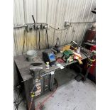 Metal shop table with vise and welding accessories