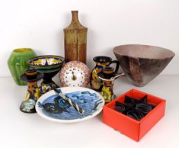 A stoneware bottle vase, 33 cm high, a novelty clock, an Art Pottery bowl, a set of six engraved