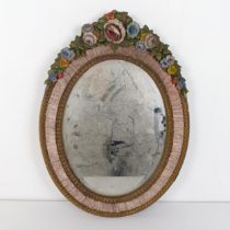 An Art Deco Barbola style oval strut mirror, decorated flowers, 57 x 47 cm