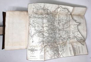 Paterson’s Roads, 1822, bound in black linen on board, with marbled endpapers and marbled page